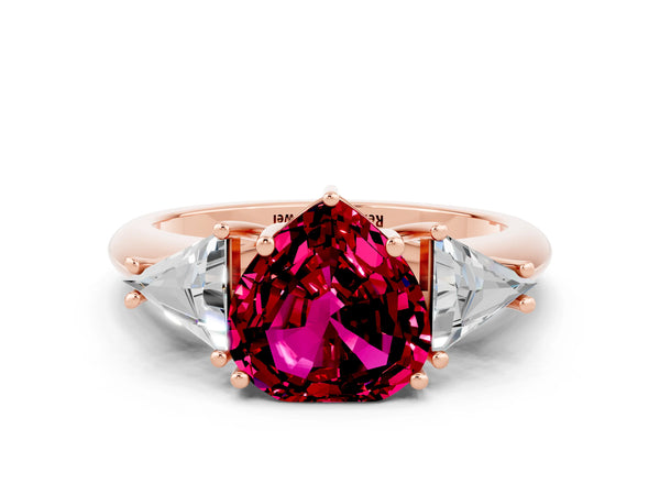 Rose gold Three-Stone Heart Cut Garnet Engagement Ring with Trillion Side Stones and Prong Setting
