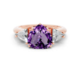 Rose gold Three-Stone Heart Cut Cut Diamond Ring with Trillion Side Stones and Four-Prong Setting