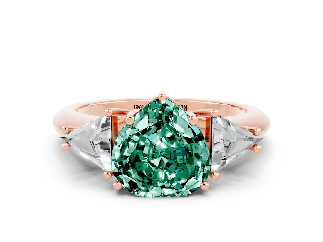 Rose gold Three-Stone Heart Cut Cut Diamond Ring with Trillion Side Stones and Four-Prong Setting