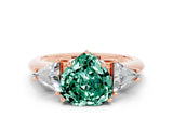 Rose gold Three-Stone Heart Cut Cut Diamond Ring with Trillion Side Stones and Four-Prong Setting