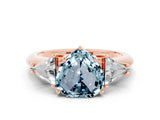 Rose gold Three-Stone Heart Cut Cut Diamond Ring with Trillion Side Stones and Four-Prong Setting