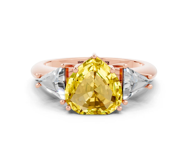 Rose gold Three-Stone Heart Cut Yellow Sapphire Engagement Ring with Trillion Side Stones and Prong Setting