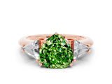 Rose gold Three-Stone Heart Cut Cut Diamond Ring with Trillion Side Stones and Four-Prong Setting