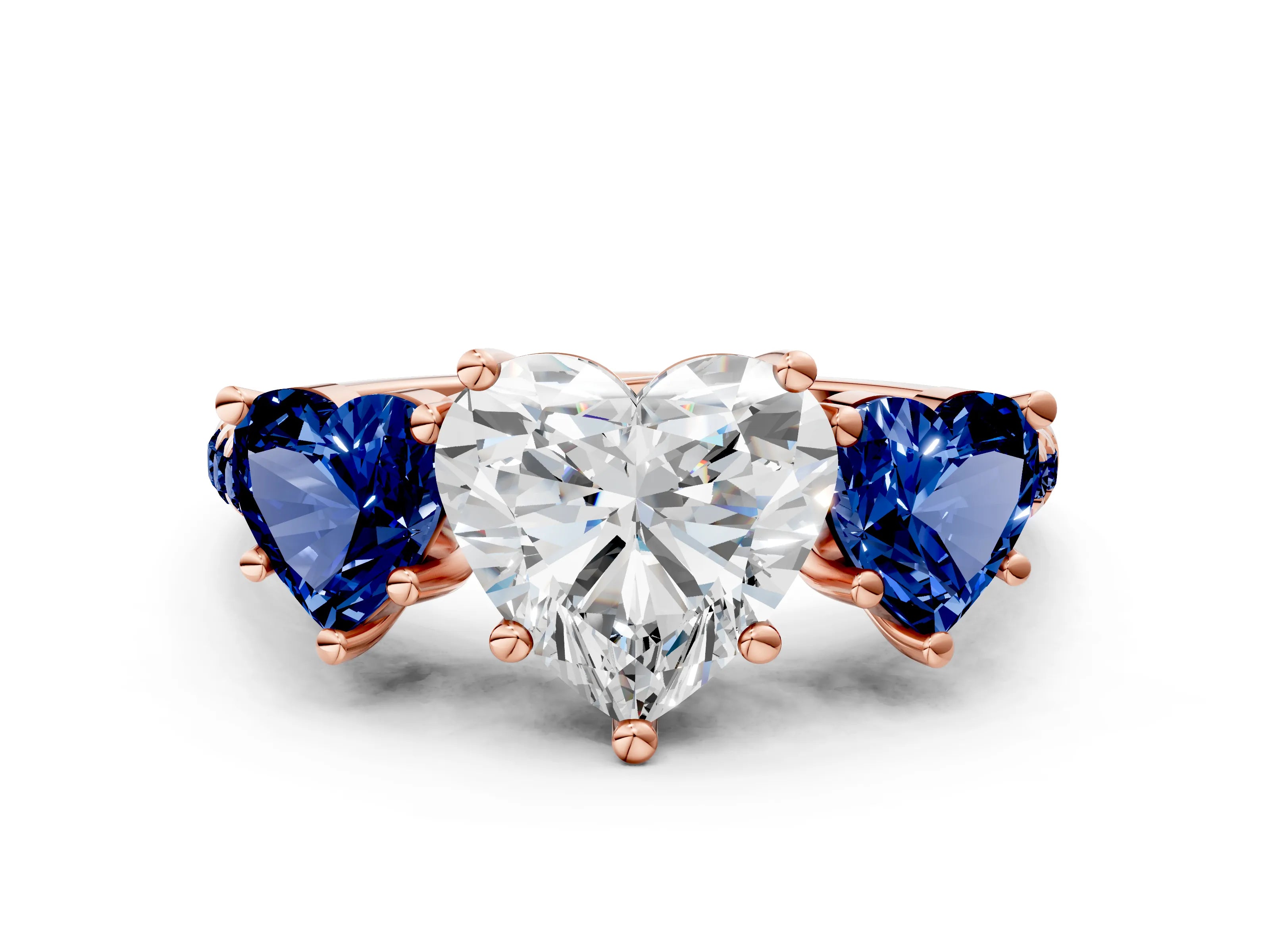 Rose gold Three-Stone Heart Cut Diamond Ring with Round with Blue Sapphire side stone Pavé Band and Prong Setting