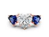 Rose gold Three-Stone Heart Cut Diamond Ring with Round with Blue Sapphire side stone Pavé Band and Prong Setting