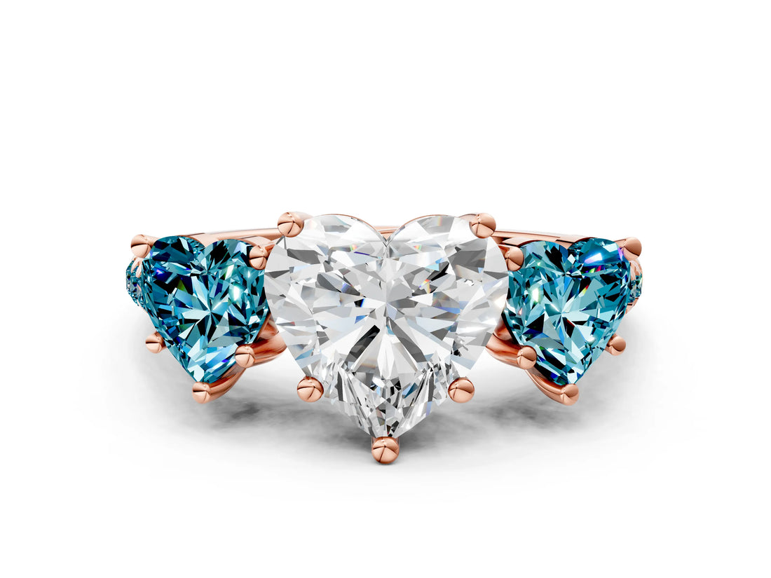 Rose gold Three-Stone Heart Cut Diamond Ring with Round with Blue Topaz side stone Pavé Band and Prong Setting