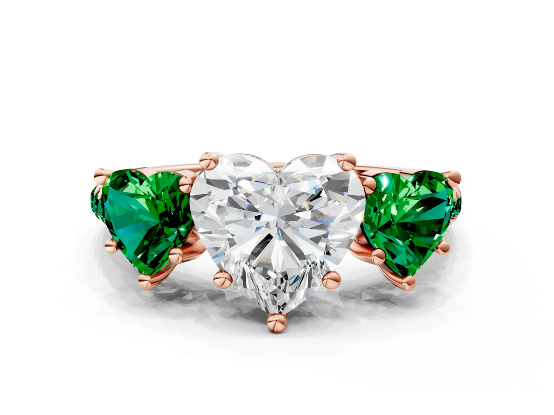 Rose gold Three-Stone Heart Cut Diamond Ring with Round with Emerald side stone Pavé Band and Prong Setting