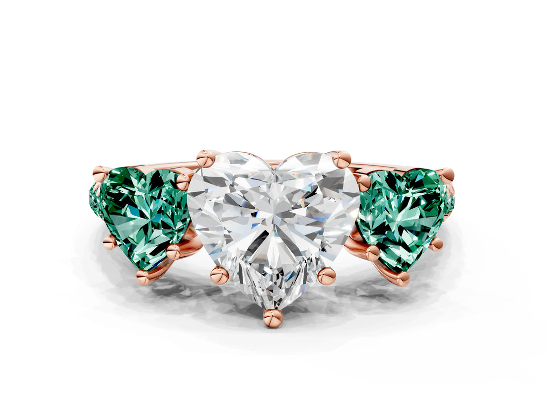 Rose gold Three-Stone Heart Cut Diamond Ring with Round with Green Sapphire side stone Pavé Band and Prong Setting
