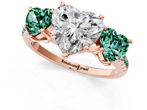 Rose gold Three-Stone Heart Cut Diamond Ring with Round with Green Sapphire side stone Pavé Band and Prong Setting_1