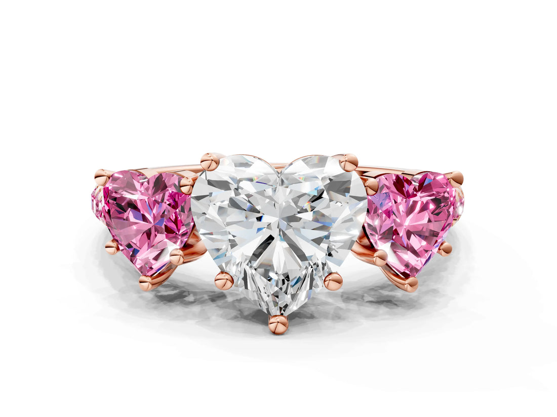 Rose gold Three-Stone Heart Cut Diamond Ring with Round with Pink Sapphire side stone Pavé Band and Prong Setting