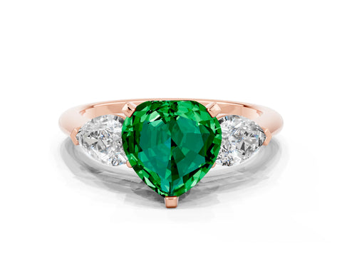 Rose gold Three-Stone Heart Cut Emerald Ring with Pear Side Stones and Four-Prong Setting