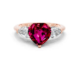 Rose gold Three-Stone Heart Cut Garnet Ring with Pear Side Stones and Four-Prong Setting
