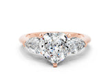Rose gold Three-Stone Heart Cut Moissanite Ring with Pear Side Stones and Four-Prong Setting