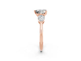 Rose gold Three-Stone Heart Cut Moissanite Ring with Pear Side Stones and Four-Prong Setting_2