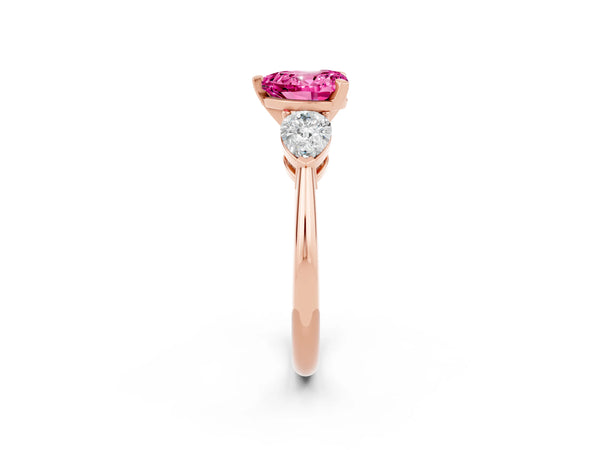 Rose gold Three-Stone Heart Cut Pink Sapphire Ring with Pear Side Stones and Four-Prong Setting