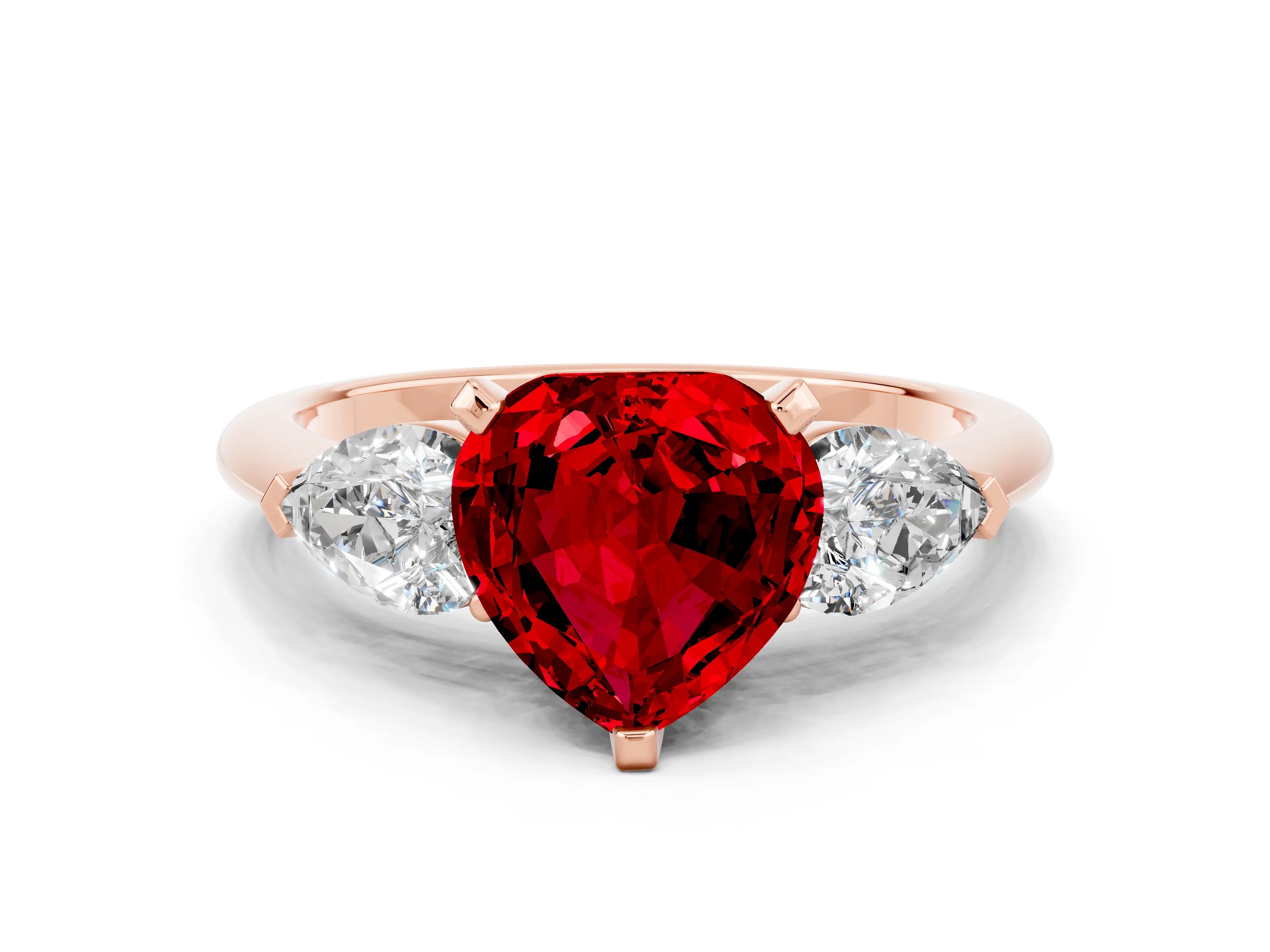 Rose gold Three-Stone Heart Cut Ruby Ring with Pear Side Stones and Four-Prong Setting