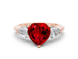 Rose gold Three-Stone Heart Cut Ruby Ring with Pear Side Stones and Four-Prong Setting