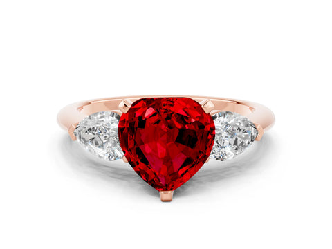Rose gold Three-Stone Heart Cut Ruby Ring with Pear Side Stones and Four-Prong Setting