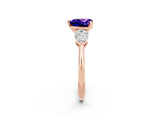 Rose gold Three-Stone Heart Cut Tanzanite Ring with Pear Side Stones and Four-Prong Setting_2