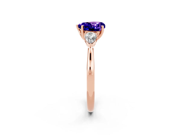 Rose gold Three-Stone Heart Cut Tanzanite Ring with Pear  Side Stones in Four-Prong Setting
