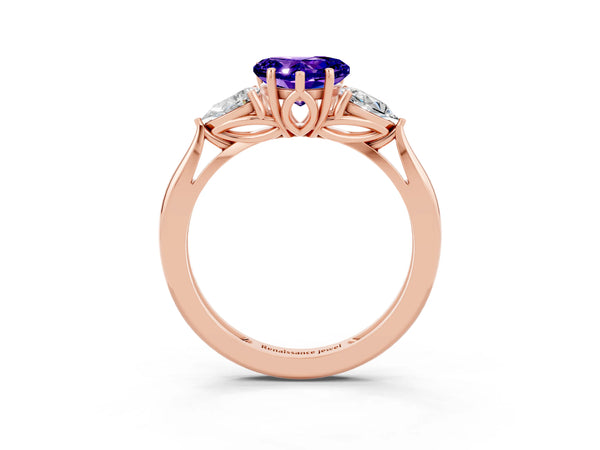 Rose gold Three-Stone Heart Cut Tanzanite Ring with Pear  Side Stones in Four-Prong Setting