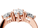 Rose gold Three-Stone Marquise Brilliant Cut Solitaire Ring with Prong Setting on a Classic Band