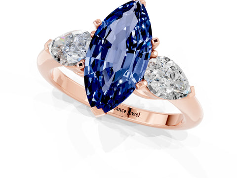 Rose gold Three-Stone Marquise Cut Blue Sapphire Ring with Pear Side Stones and Four-Prong Setting_1
