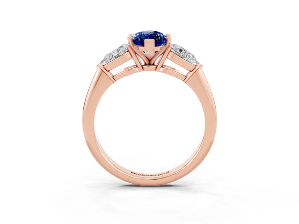 Rose gold Three-Stone Marquise Cut Blue Sapphire Ring with Pear Side Stones and Four-Prong Setting