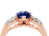 Rose gold Three-Stone Marquise Cut Blue Sapphire Ring with Pear Side Stones and Four-Prong Setting_4