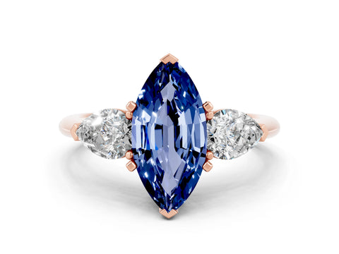 Rose gold Three-Stone Marquise Cut Blue Sapphire Ring with Pear Side Stones and Four-Prong Setting