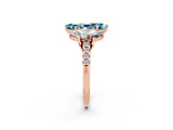 Rose gold Three-Stone Marquise Cut Blue Topaz Ring with Pavé Band and Prong Setting_14