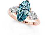 Rose gold Three-Stone Marquise Cut Blue Topaz Ring with Pear Side Stones and Four-Prong Setting_1