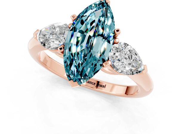 Rose gold Three-Stone Marquise Cut Blue Topaz Ring with Pear Side Stones and Four-Prong Setting