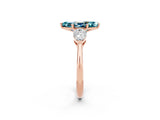 Rose gold Three-Stone Marquise Cut Blue Topaz Ring with Pear Side Stones and Four-Prong Setting_2