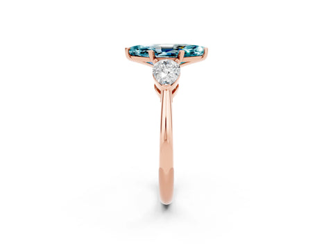 Rose gold Three-Stone Marquise Cut Blue Topaz Ring with Pear Side Stones and Four-Prong Setting_2