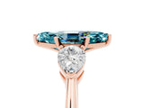 Rose gold Three-Stone Marquise Cut Blue Topaz Ring with Pear Side Stones and Four-Prong Setting_5