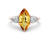 Rose gold Three-Stone Marquise Cut Citrine Ring with Pear Side Stones and Four-Prong Setting