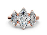 Rose gold Three-Stone Marquise Cut Cut Diamond Ring with Channel Set Band and Four-Prong Setting_31