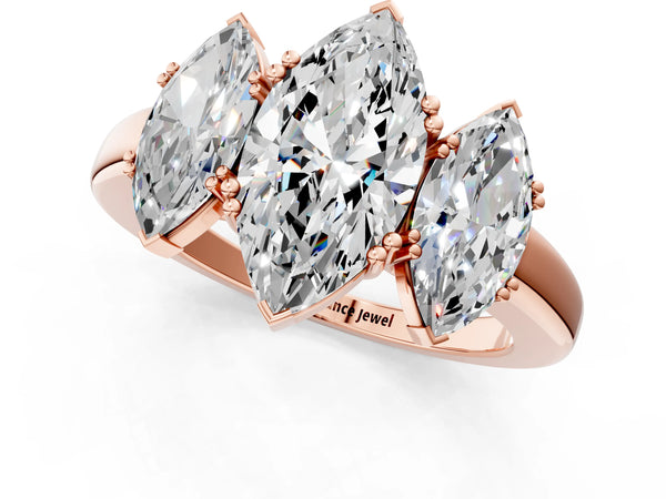 Rose gold Three-Stone Marquise Cut Cut Diamond Ring with Channel Set Band and Four-Prong Setting