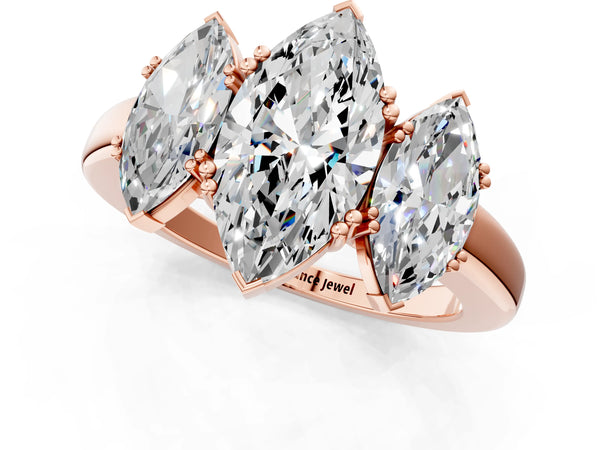 Rose gold Three-Stone Marquise Cut Cut Diamond Ring with Channel Set Band and Four-Prong Setting