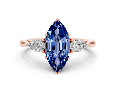 Rose gold Three-Stone Marquise Cut Cut Diamond Ring with Pear Side Stones in Four-Prong Setting
