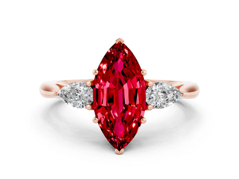 Rose gold Three-Stone Marquise Cut Cut Diamond Ring with Pear Side Stones in Four-Prong Setting