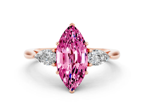 Rose gold Three-Stone Marquise Cut Cut Diamond Ring with Pear Side Stones in Four-Prong Setting