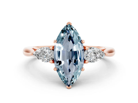 Rose gold Three-Stone Marquise Cut Cut Diamond Ring with Pear Side Stones in Four-Prong Setting