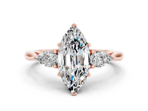 Rose gold Three-Stone Marquise Cut Cut Diamond Ring with Pear Side Stones in Four-Prong Setting