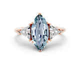 Rose gold Three-Stone Marquise Cut Cut Diamond Ring with Trillion Side Stones and Four-Prong Setting_11