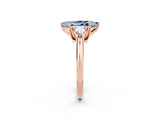Rose gold Three-Stone Marquise Cut Cut Diamond Ring with Trillion Side Stones and Four-Prong Setting_13