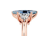 Rose gold Three-Stone Marquise Cut Cut Diamond Ring with Trillion Side Stones and Four-Prong Setting_16