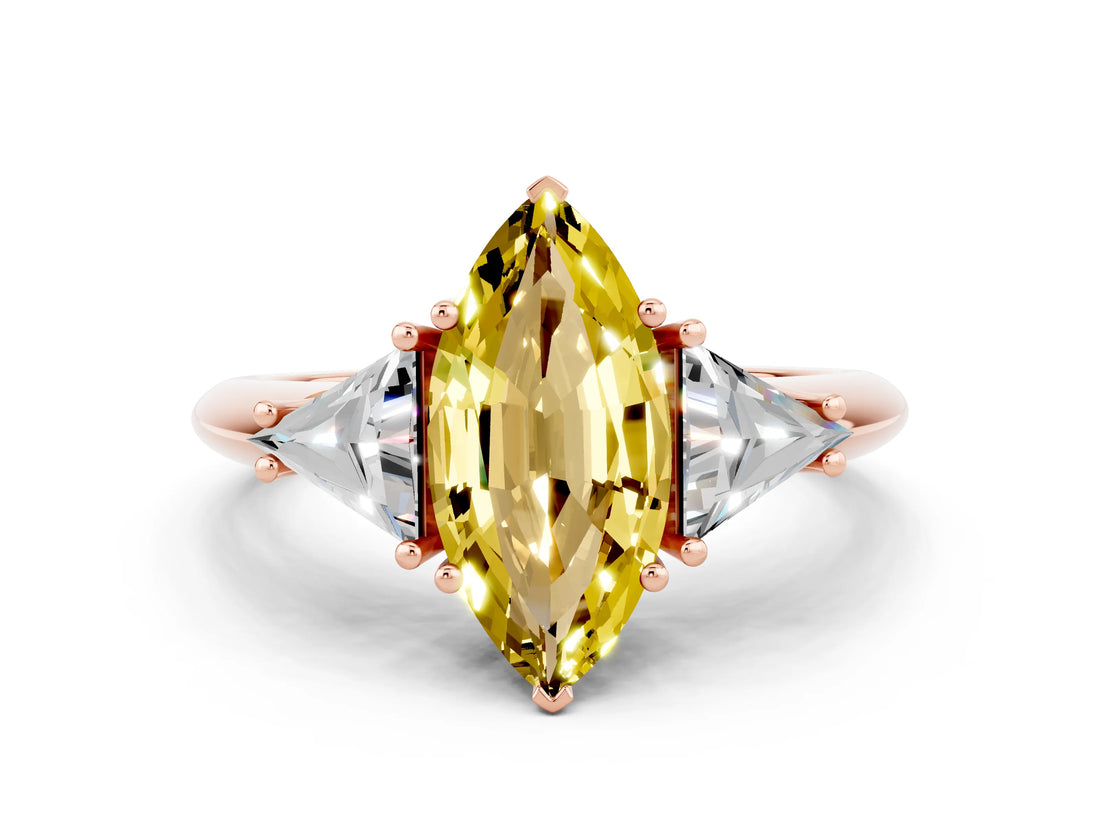 Rose gold Three-Stone Marquise Cut Cut Diamond Ring with Trillion Side Stones and Four-Prong Setting