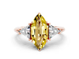 Rose gold Three-Stone Marquise Cut Cut Diamond Ring with Trillion Side Stones and Four-Prong Setting